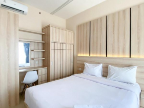 Spacious and Homey 1BR Vasanta Innopark Apartment By Travelio